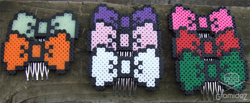 Perler Bead bows made out of beads that glow in the dark.